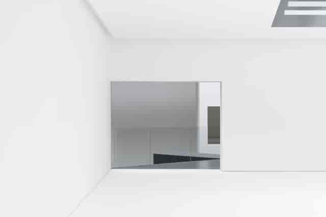 Minimalist meeting space with natural light for creative brainstorming sessions.