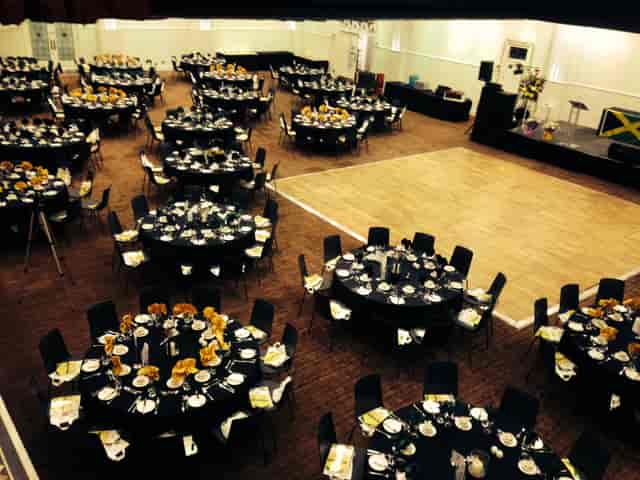 The Holte Suite banquet setup with round tables and dance floor for gala or wedding reception.