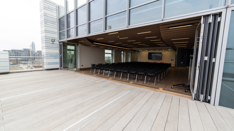 Battersea Dogs & Cats Home auditorium with floor-to-ceiling windows for events.