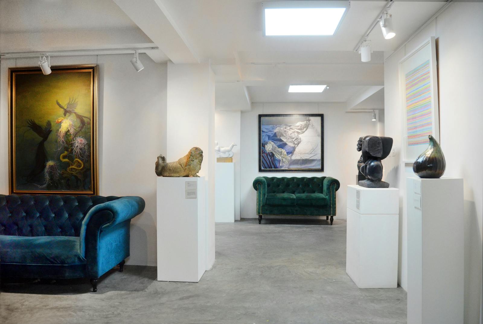 Stylish gallery space with plush seating for art events and meetings at Sunny Art Centre.