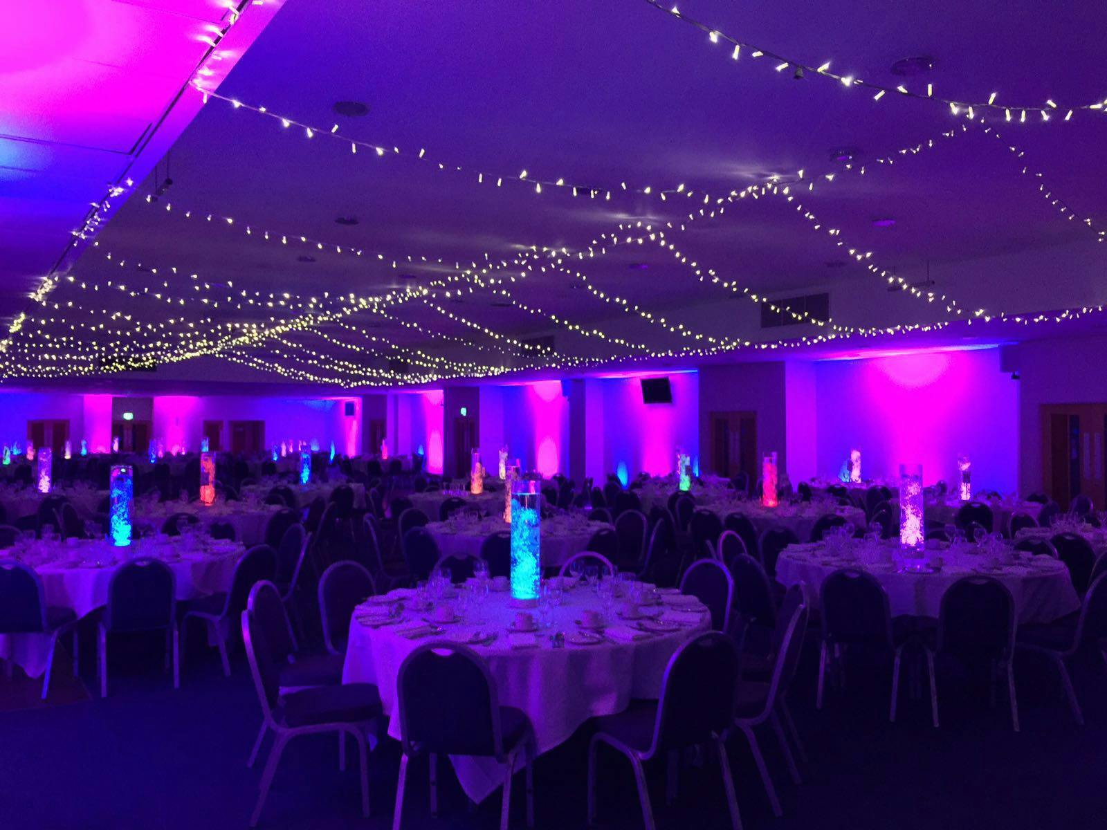 Keith Weller Lounge at Leicester City FC, elegant dinner setup for weddings and corporate events.