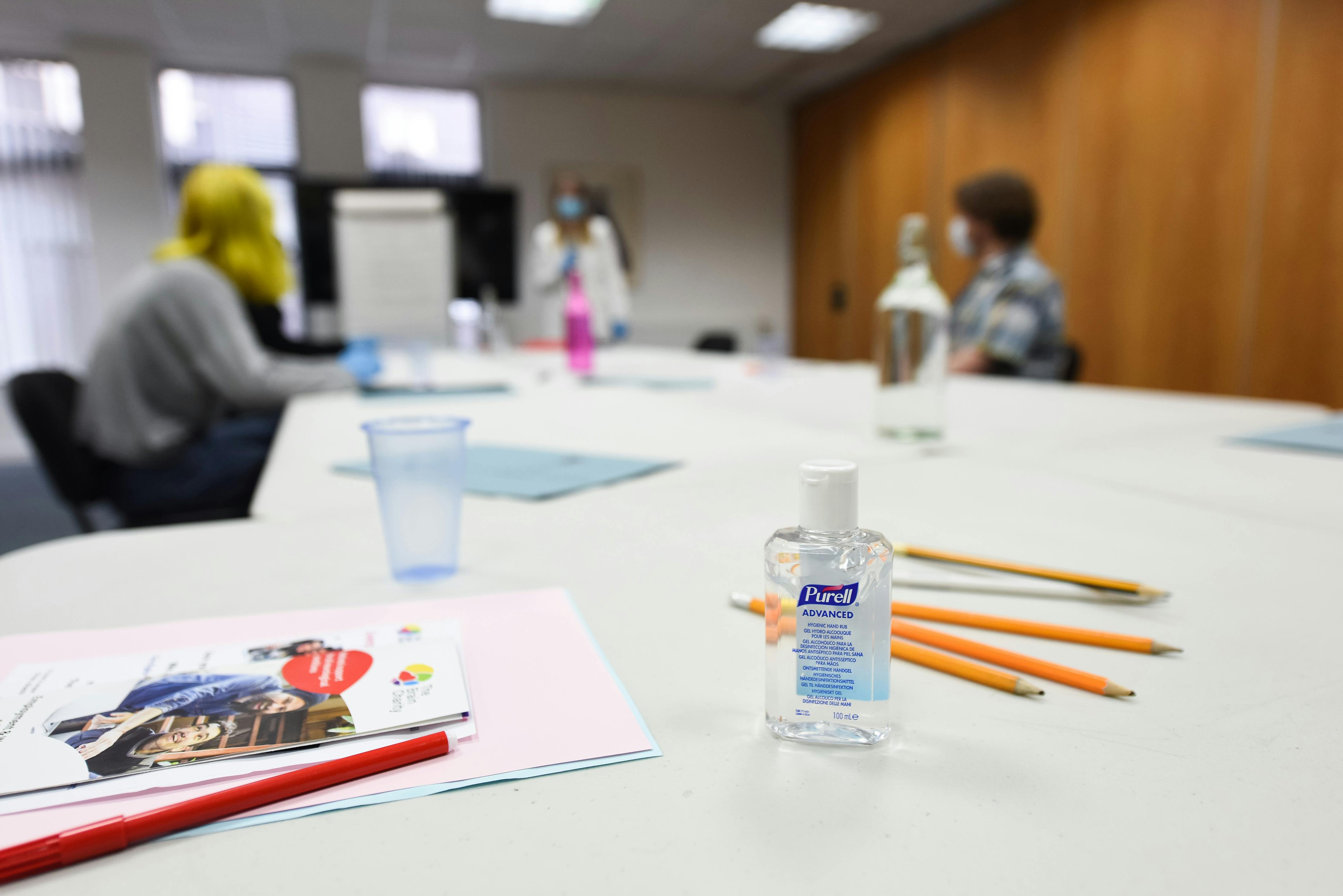Seminar Room at The Brain Charity with hand sanitizer for safe, collaborative meetings.