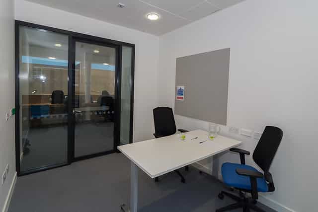 Camberwell Meeting Room 2 with glass walls, perfect for brainstorming and client meetings.