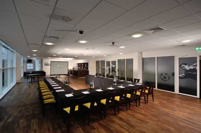 Banks Lounge at Leicester City FC: modern meeting room for corporate events, team-building.