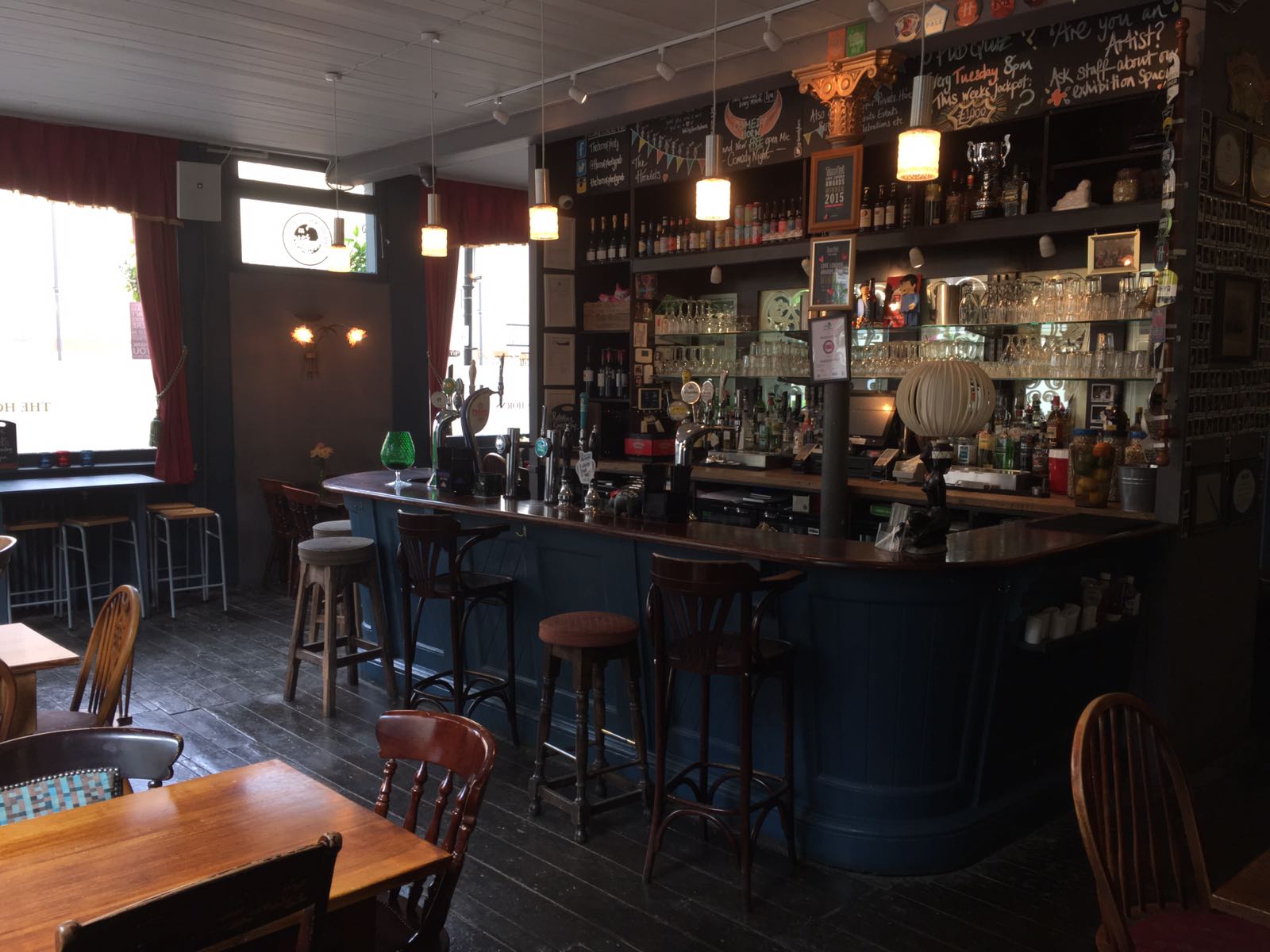 Cozy bar at The Horn of Plenty, perfect for intimate gatherings and networking events. - Banner