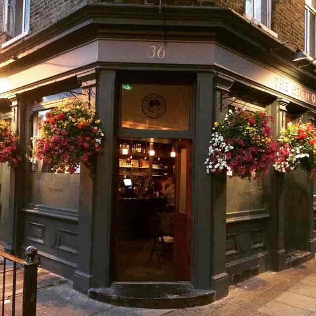 Charming pub entrance at The Horn of Plenty, perfect for team-building and networking events.