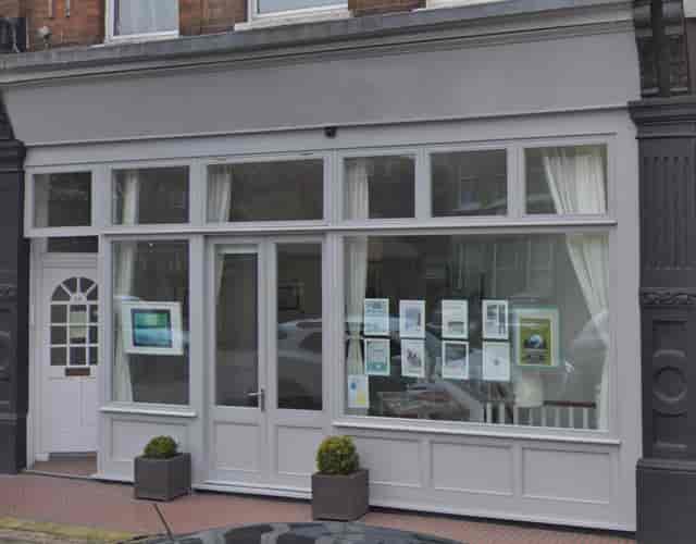 Charming venue with large windows, perfect for workshops and networking events.