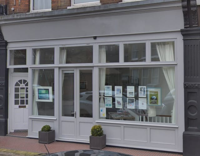 Charming venue with large windows, perfect for workshops and networking events.