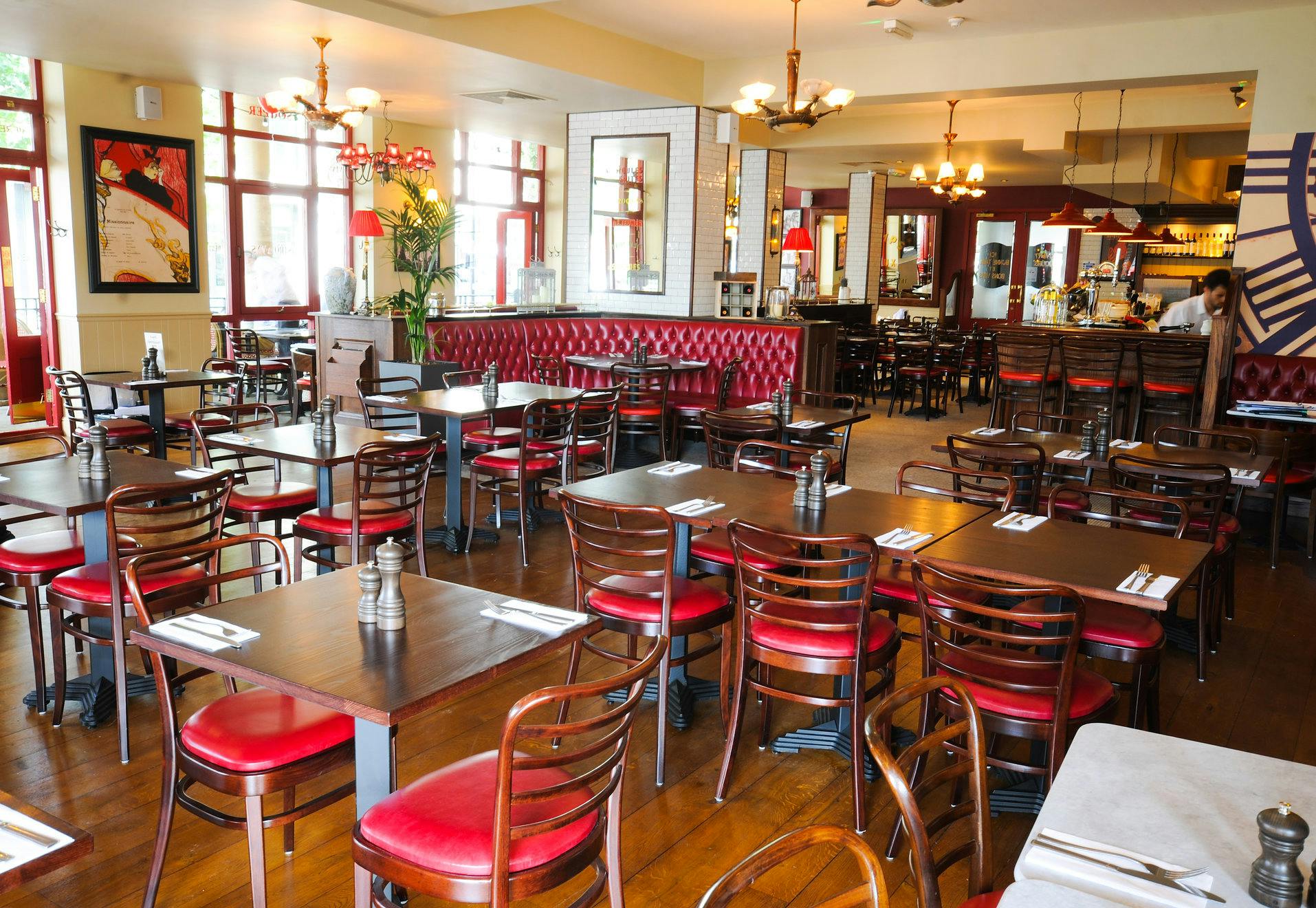 Spacious Café Rouge Greenwich venue with red accents, ideal for events and gatherings.