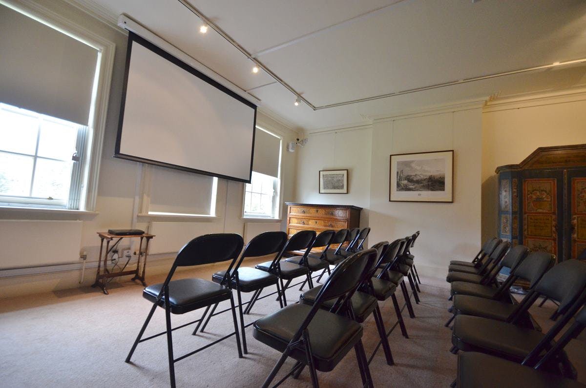 Video Room at Freud Museum London with black chairs for presentations and workshops.