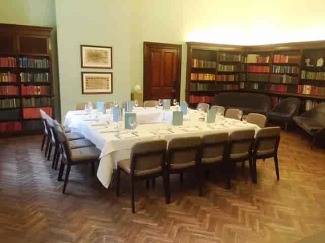 Intimate meeting space with round table at Library Bar, Cinnamon Club for small events.