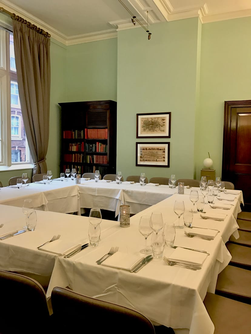 Library Bar at Cinnamon Club: U-shaped meeting room with elegant decor for strategic sessions.