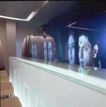 Sleek Club Bar at Cinnamon Club with digital display, perfect for upscale events.