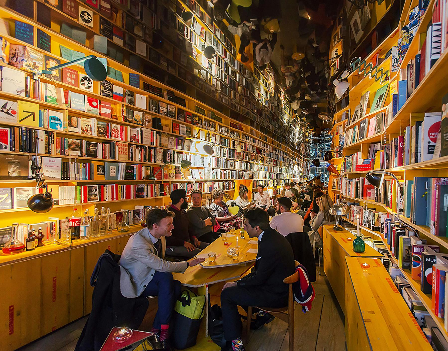 Cozy bookshop venue with warm lighting for networking events and workshops.