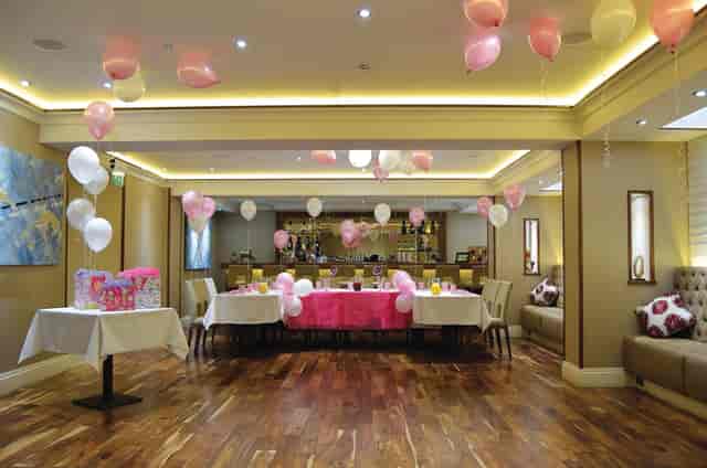 Coloured Canyon Dining Room with pink decor, ideal for baby showers and birthday parties.