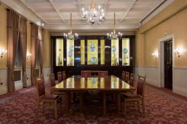 Elegant Livery Hall meeting room with wooden table, ideal for executive events.