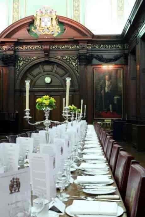 Elegant dining table in Tallow Chandlers' Hall for formal events and celebrations.
