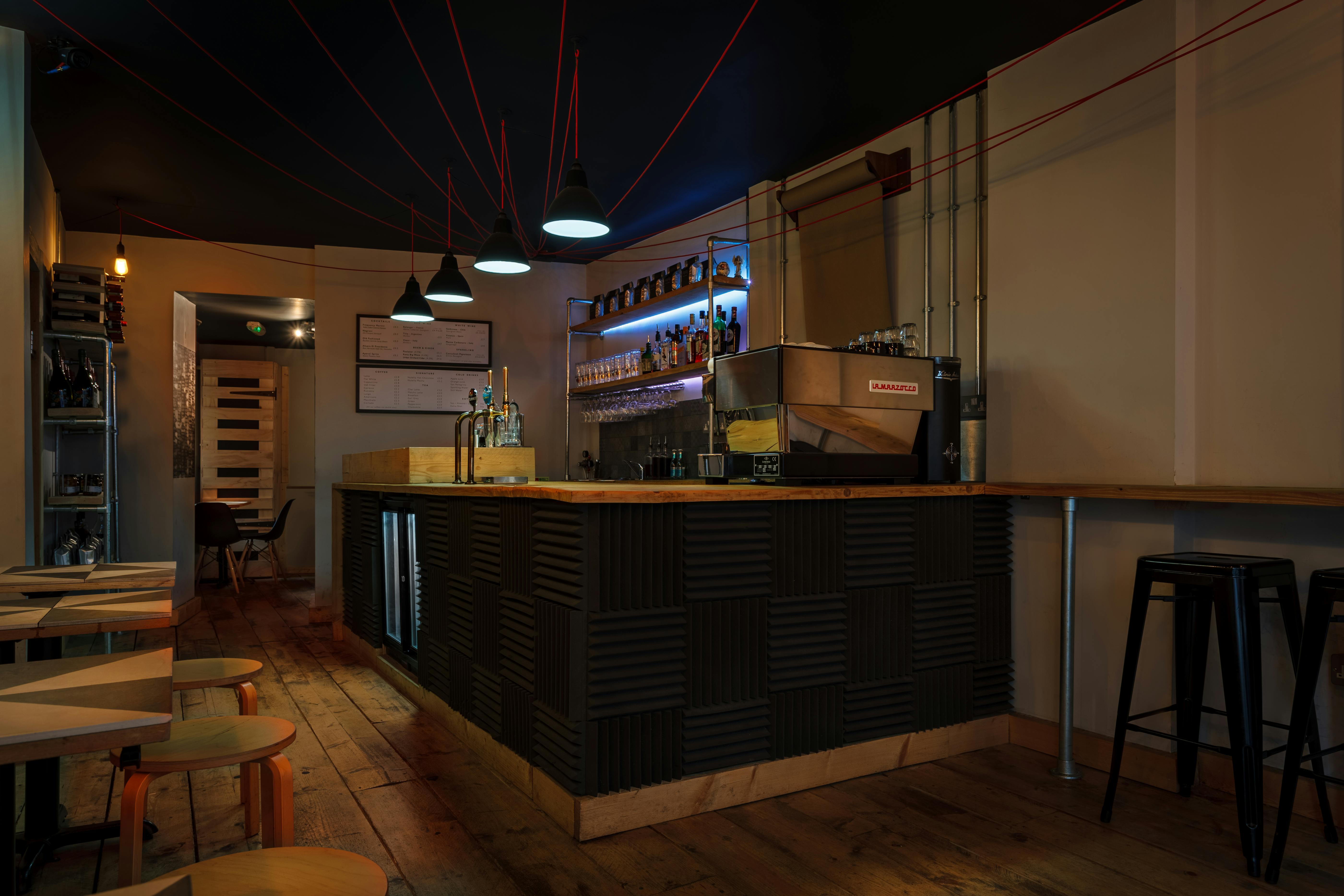 Modern bar area in Frequency, ideal for networking events and casual meetings.