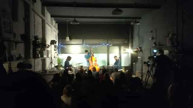 Live musical performance at The Beehive, intimate industrial venue for concert events.