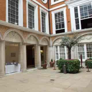 Charming courtyard at Tallow Chandlers' Hall for outdoor events and receptions.