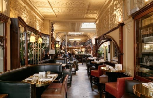 Elegant Browns Mayfair restaurant venue for upscale events, featuring cozy seating and natural light.