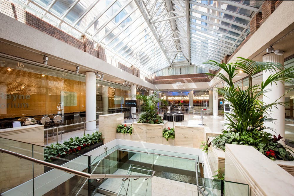 Max Rayne Atrium with glass ceiling, ideal for elegant events and gatherings.