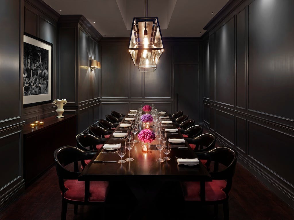 Elegant private dining room at The London EDITION, perfect for upscale events and corporate dinners.