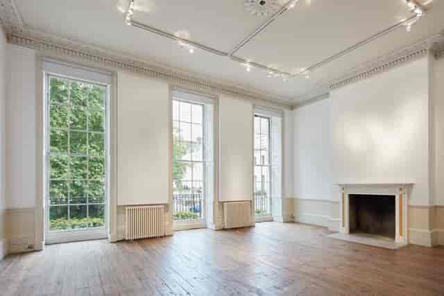 Versatile event space in Fitzroy Square House with natural light and high ceilings.