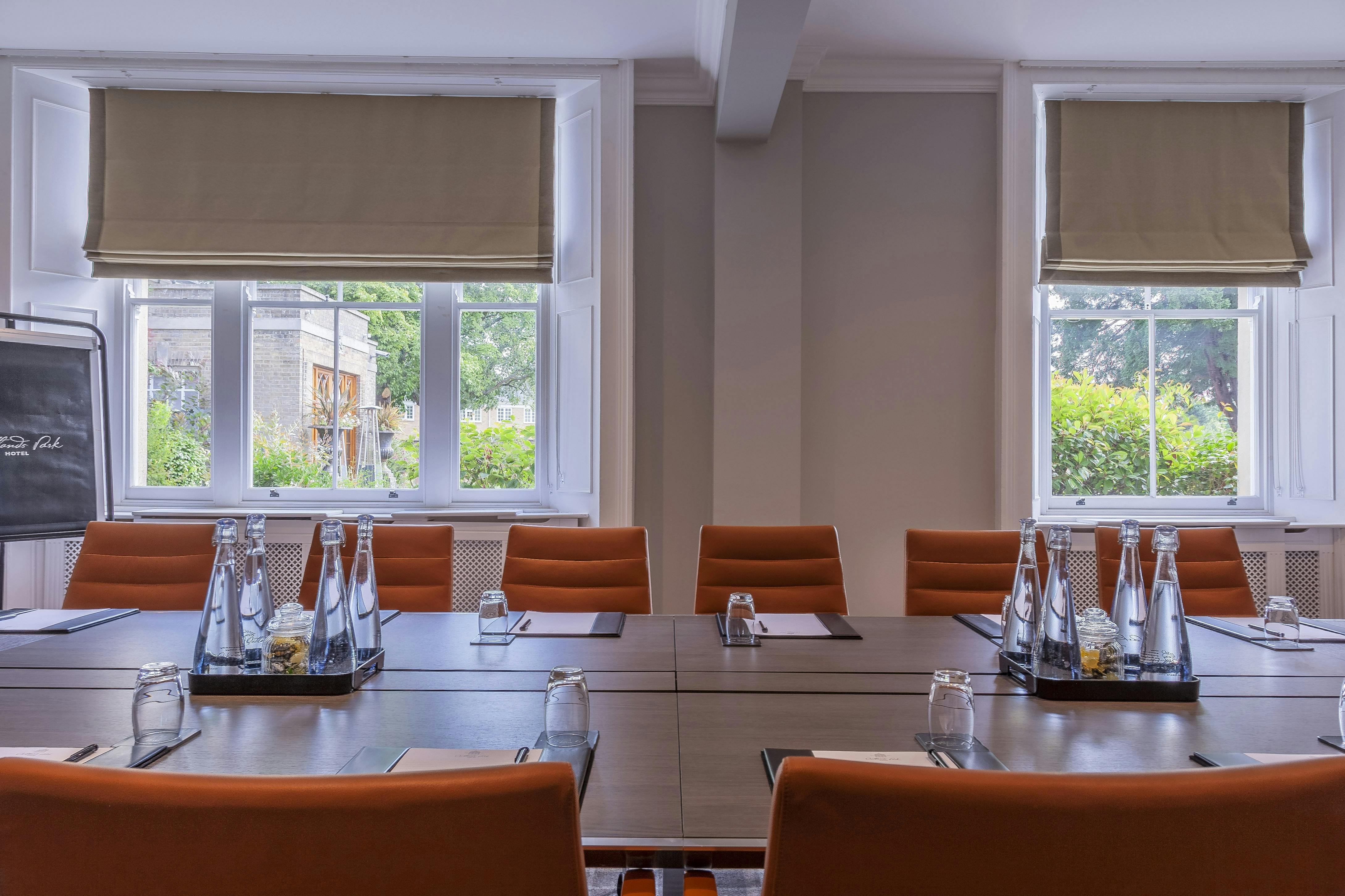 Cedar Room at Oatlands Park Hotel, bright meeting space for professional gatherings.