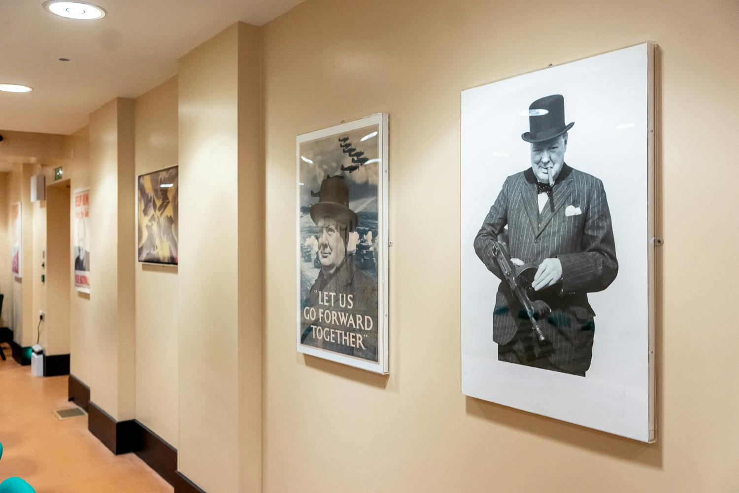 The Learning Room corridor in Churchill War Rooms with historical posters for events.