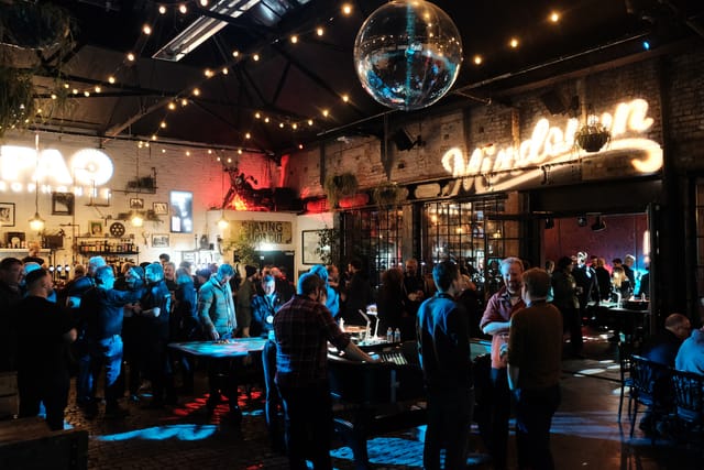 Electrowerkz industrial event space, neon lights, cocktail reception