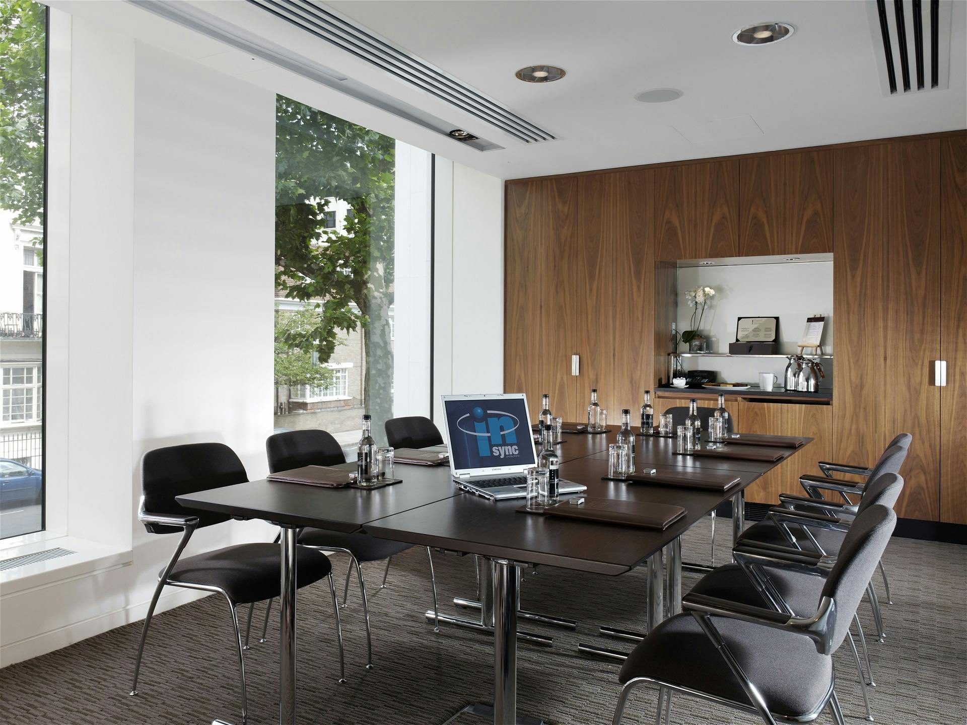 Cedar Suite meeting room in Royal Lancaster London with sleek conference table and natural light.