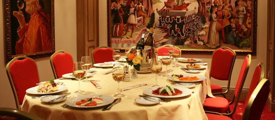 Elegant dining table in Venetian Room, perfect for corporate dinners and special events.