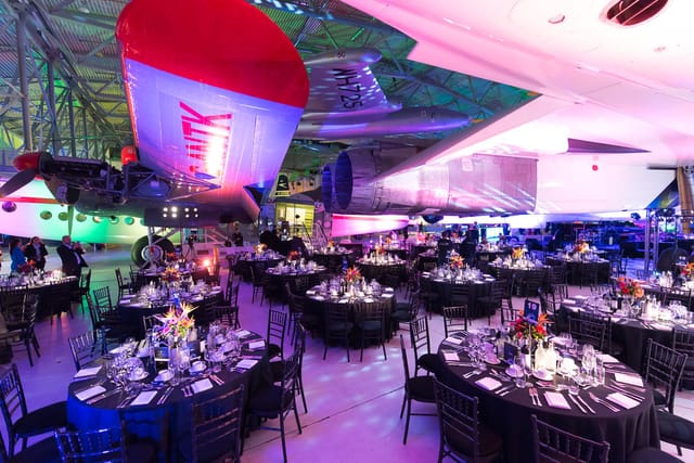 AirSpace Exhibition at IWM Duxford with vintage aircraft, ideal for corporate events.