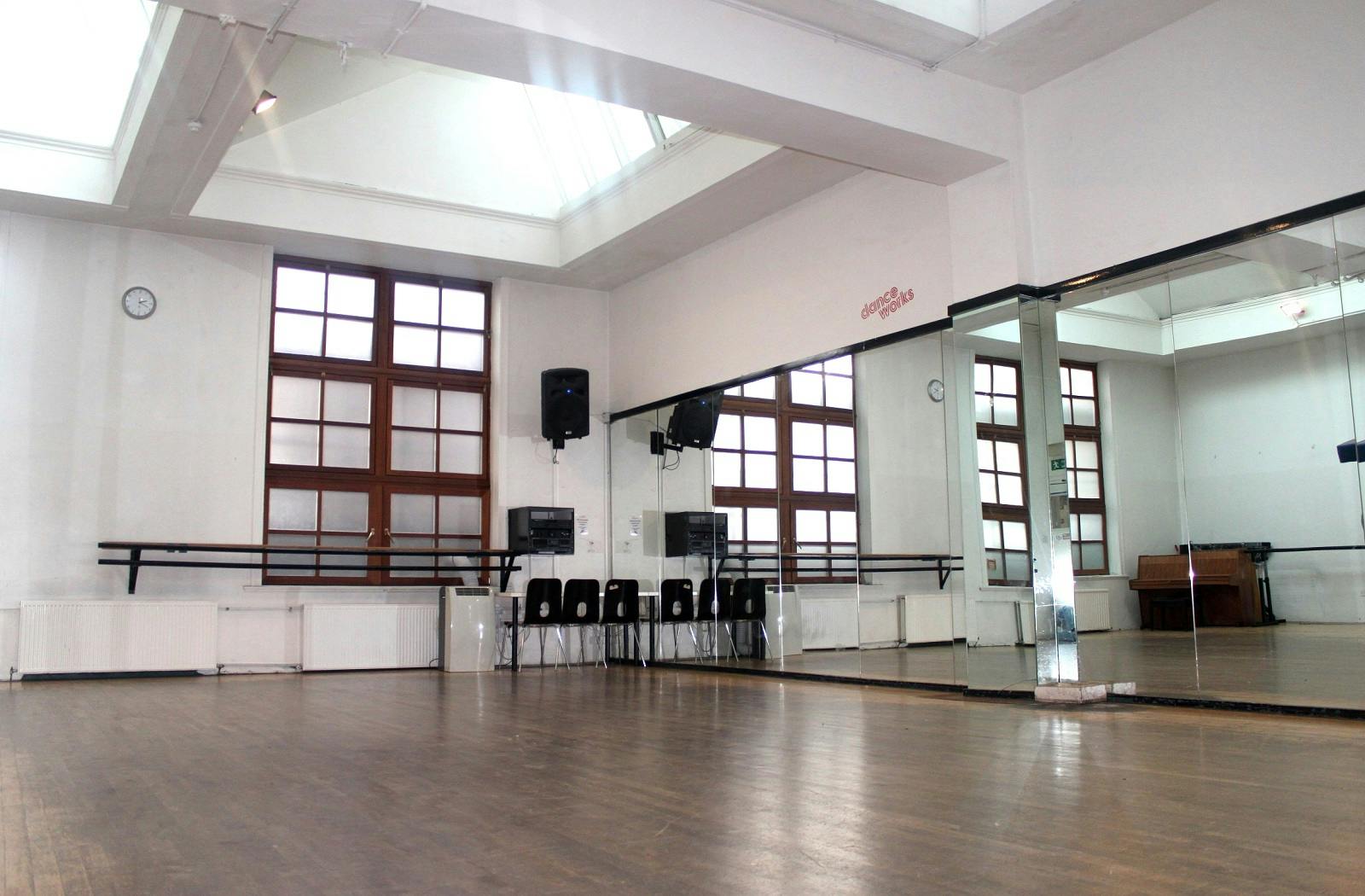 Versatile Danceworks Studio 1 with mirrored wall, ideal for workshops and classes.