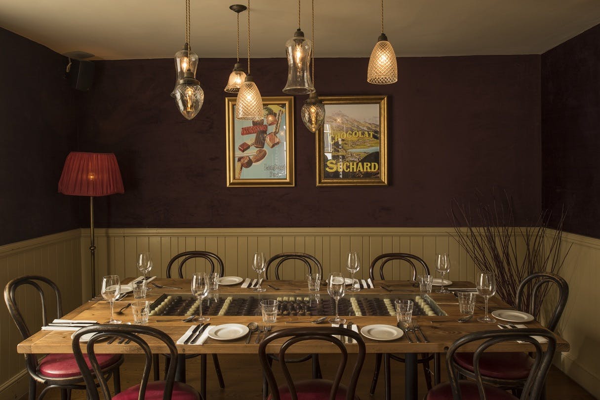 Intimate dining space at Cafe Rouge Leamington Spa for private events and meetings.