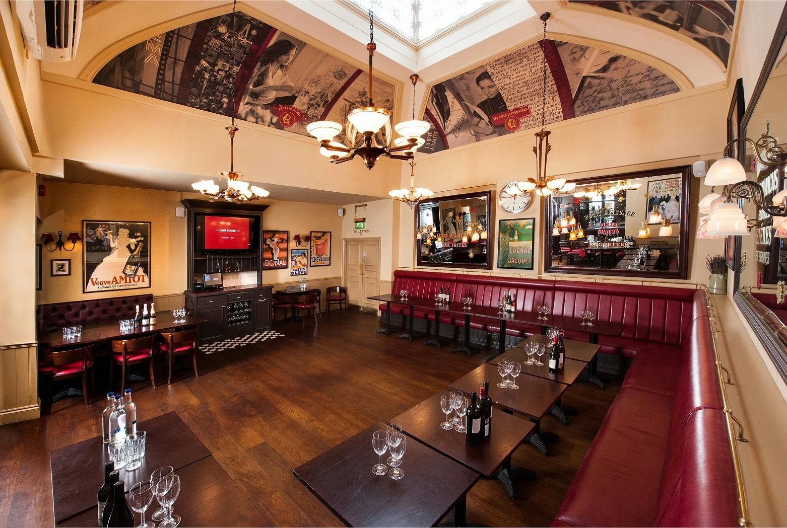 Private dining room at Cafe Rouge Edinburgh with elegant chandeliers for events.