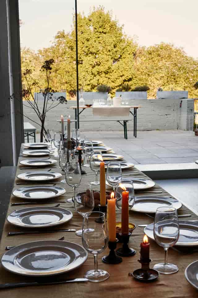 Long-table dinner setup at Autumn Yard for upscale corporate events and intimate micro-gatherings.