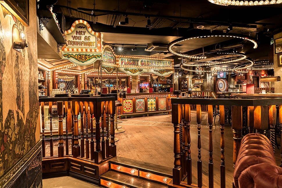 Vibrant venue with vintage decor for unique events at Flight Club Bloomsbury.