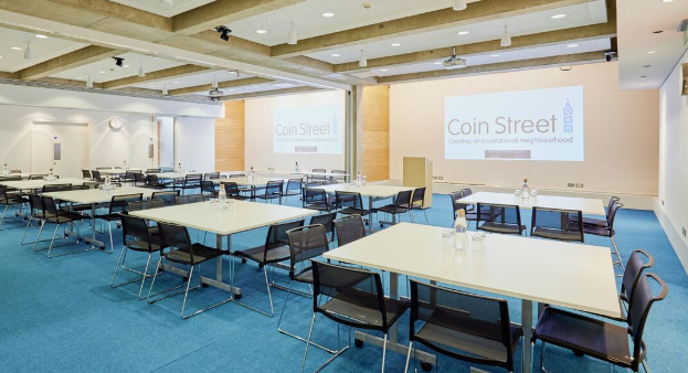 Versatile meeting space with natural light for conferences and workshops at Coin Street Centre. - Banner