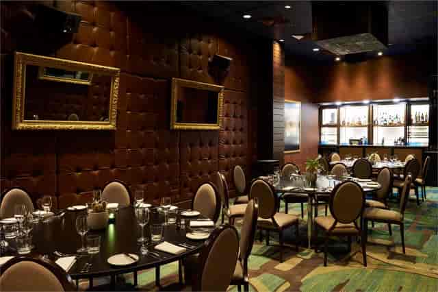 Elegant dining room at Virgin Hotels London Shoreditch, ideal for corporate events and gatherings.