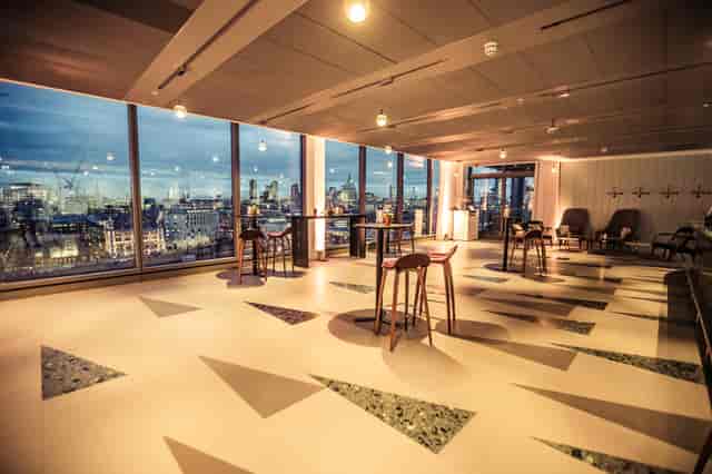 Cucumber event space with city views, ideal for networking and gatherings.