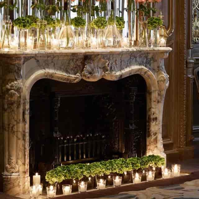 Ornate marble fireplace at Claridge's French Salon for luxury wedding and gala event decor.