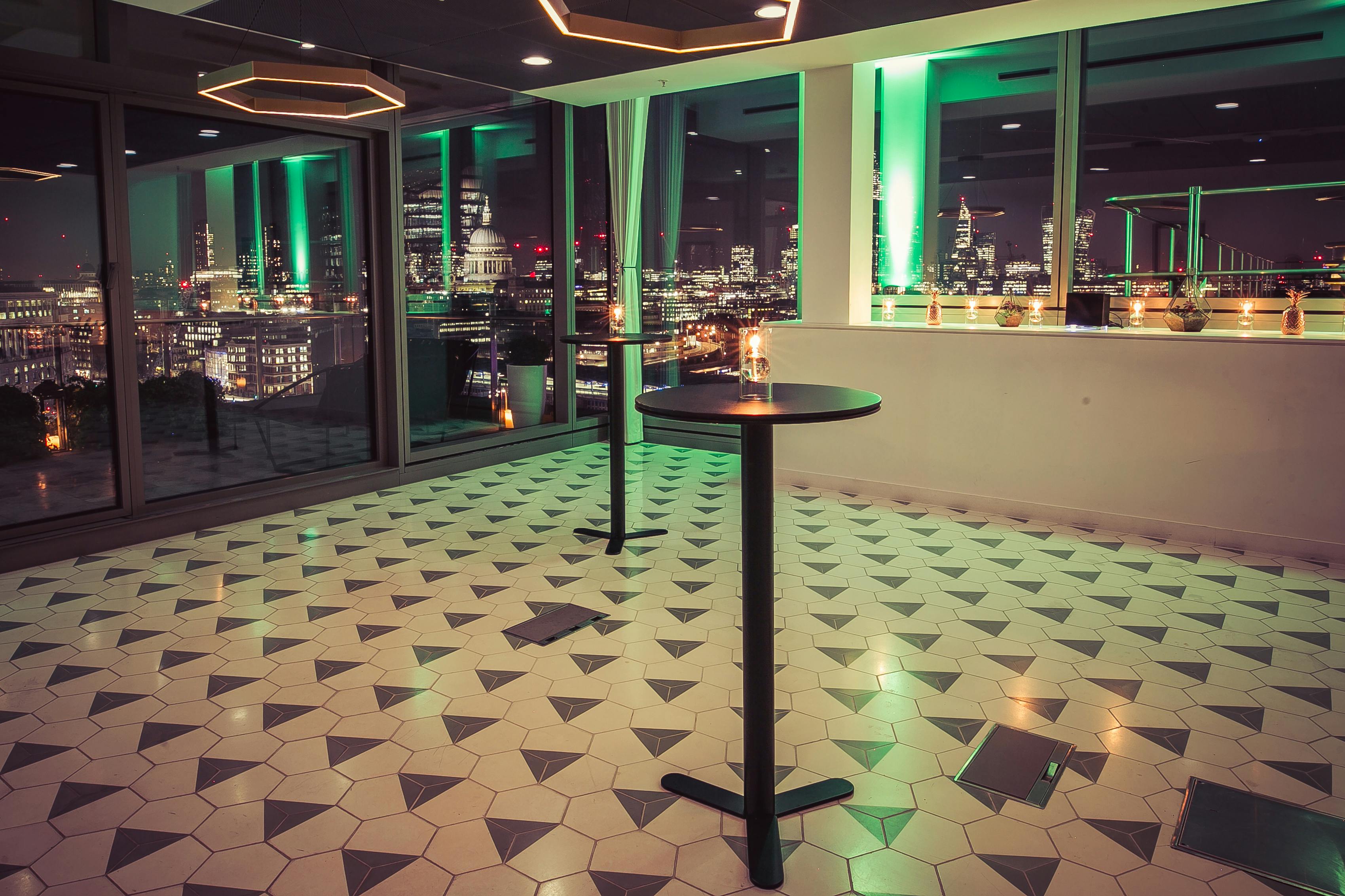 Sleek event space at The Wren, ideal for networking and cocktail receptions with city views.