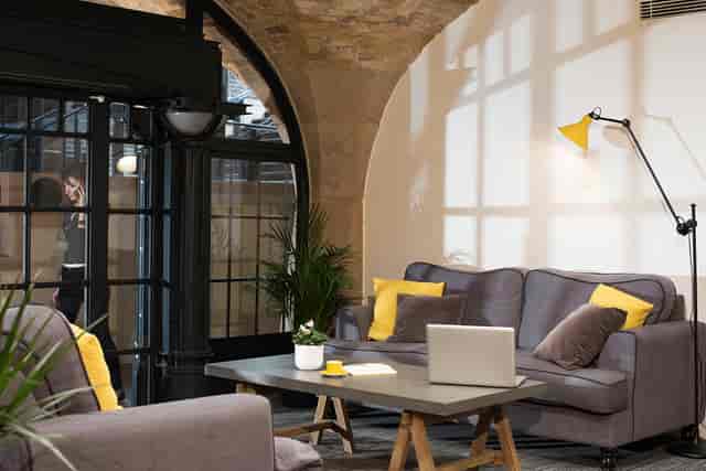 Stylish lounge area in Whole Meeting Room Suite, ideal for networking events and collaboration.