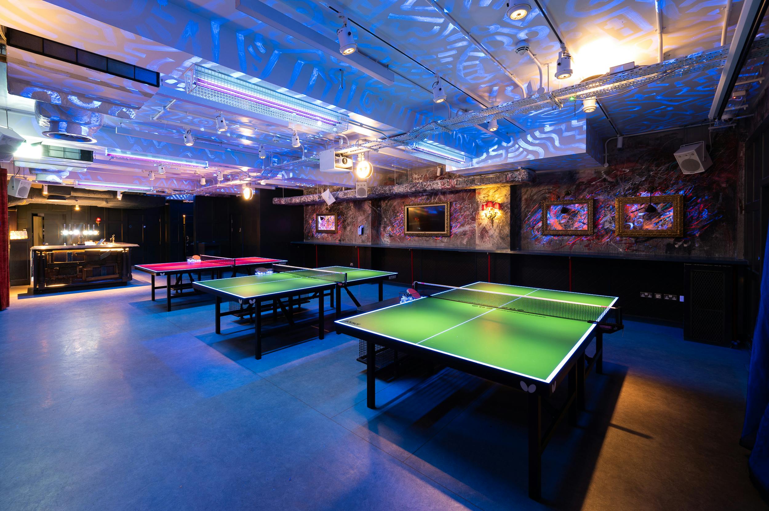 Private event room with ping pong tables in Bounce Old Street, ideal for team-building and social events.