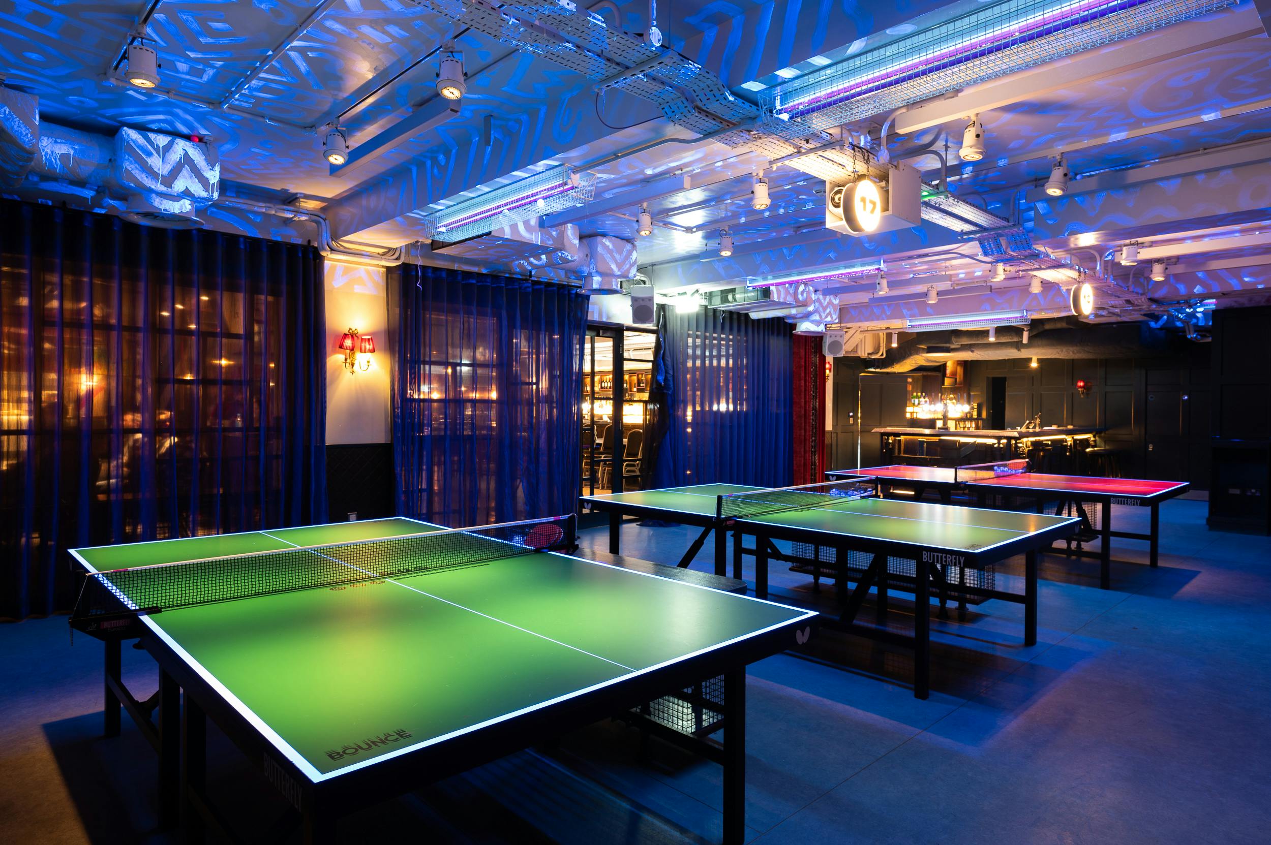Private event room with ping pong tables for corporate gatherings in Shoreditch.