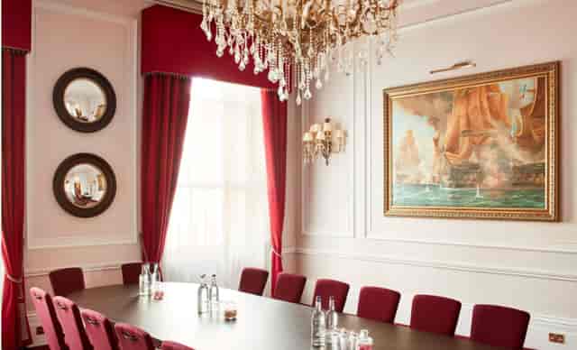Sophisticated meeting room at The Trafalgar, featuring an elegant chandelier for corporate events.