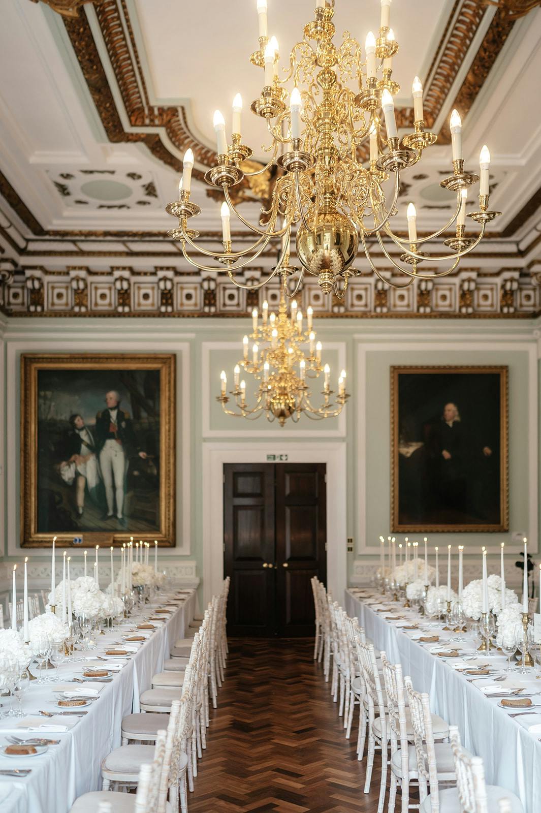 Elegant Council Room with grand chandelier, ideal for upscale events and meetings.