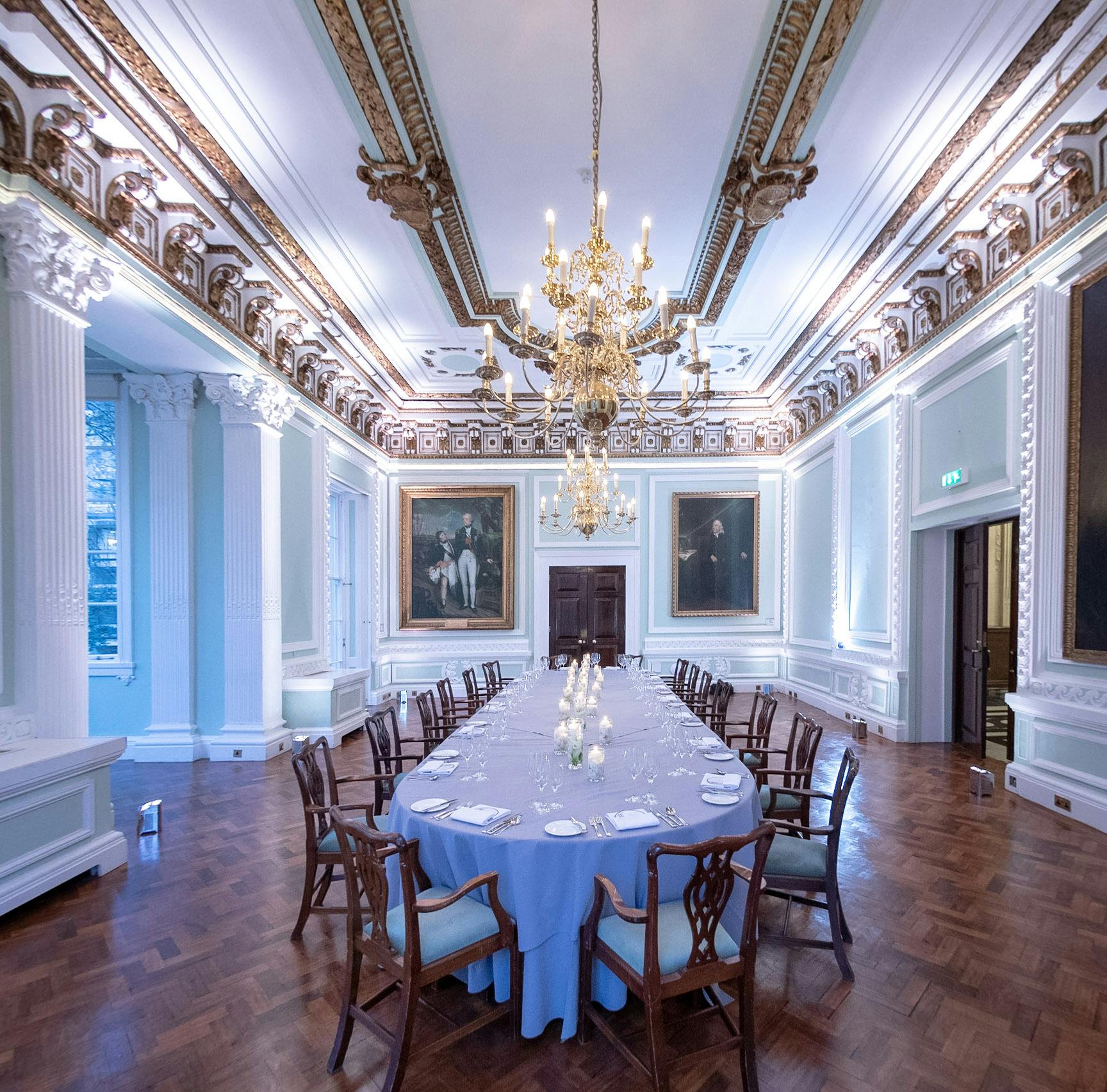 Elegant Council Room with chandelier, ideal for formal meetings and events.